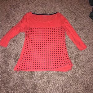 Red fitted tee with navy polka-dots